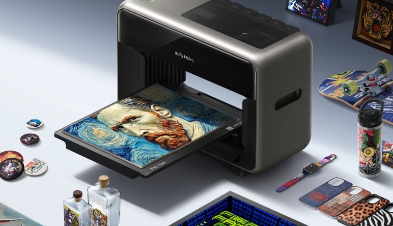 eufyMake E1 UV printer with a printed sheet on the bed